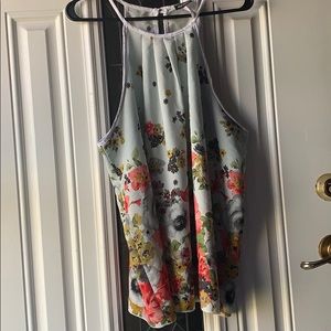 White floral printed top.